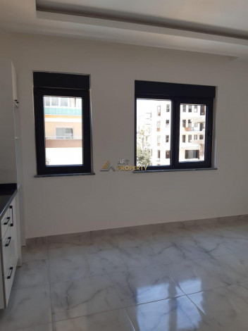 Двухкомнатная квартира в новом доме в 350 метрах от моря в Махмутлар, 53 м2 - Ракурс 20