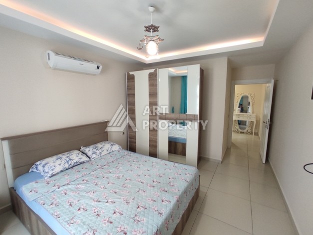 Просторная квартира 1+1 в Махмутларе, 600 метров до пляжа - Ракурс 24