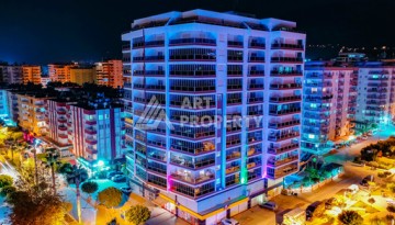 Срочная продажа большой квартиры 1+1 в элитном ЖК, 100 метров от моря в Махмутларе - Ракурс 3