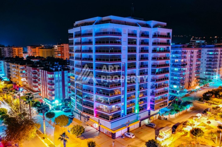 Срочная продажа большой квартиры 1+1 в элитном ЖК, 100 метров от моря в Махмутларе - Ракурс 2