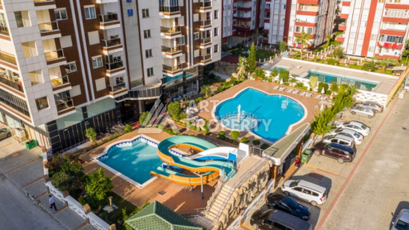 Срочная продажа большой квартиры 1+1 в элитном ЖК, 100 метров от моря в Махмутларе - Ракурс 6