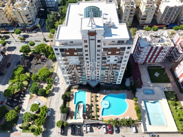 Срочная продажа большой квартиры 1+1 в элитном ЖК, 100 метров от моря в Махмутларе - Ракурс 7