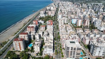 Срочная продажа большой квартиры 1+1 в элитном ЖК, 100 метров от моря в Махмутларе - Ракурс 10