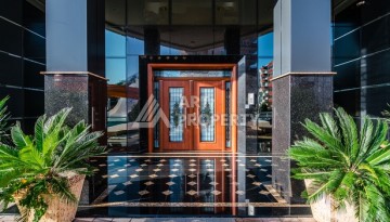 Срочная продажа большой квартиры 1+1 в элитном ЖК, 100 метров от моря в Махмутларе - Ракурс 13