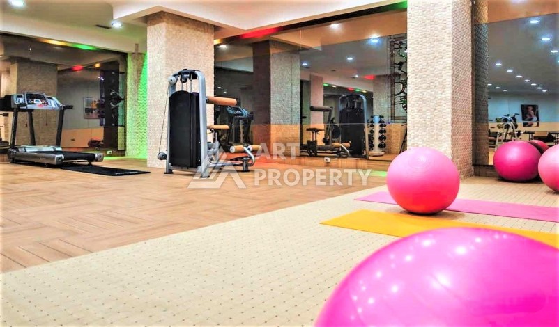 Срочная продажа большой квартиры 1+1 в элитном ЖК, 100 метров от моря в Махмутларе - Ракурс 13