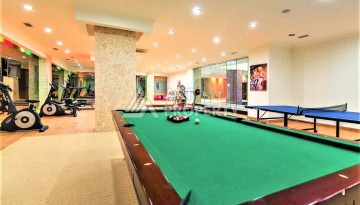 Срочная продажа большой квартиры 1+1 в элитном ЖК, 100 метров от моря в Махмутларе - Ракурс 15