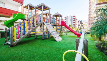 Срочная продажа большой квартиры 1+1 в элитном ЖК, 100 метров от моря в Махмутларе - Ракурс 16