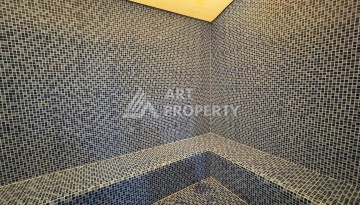 Срочная продажа большой квартиры 1+1 в элитном ЖК, 100 метров от моря в Махмутларе - Ракурс 19