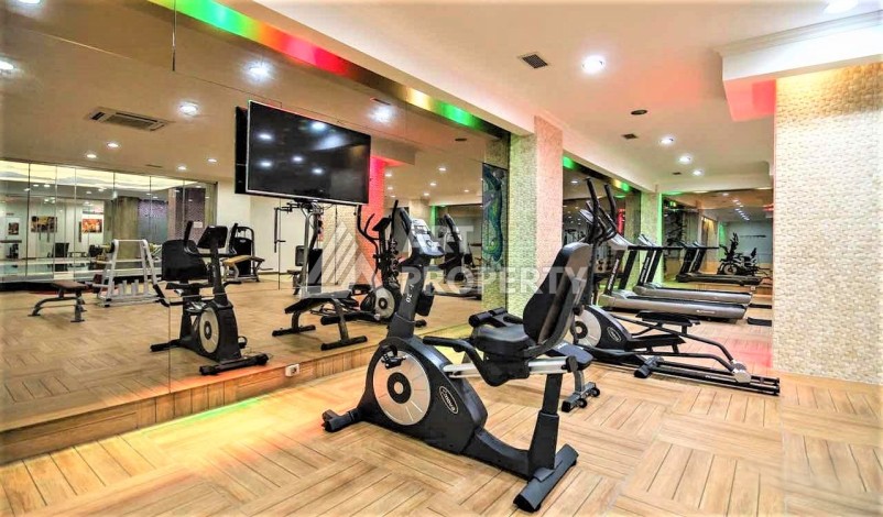 Срочная продажа большой квартиры 1+1 в элитном ЖК, 100 метров от моря в Махмутларе - Ракурс 19