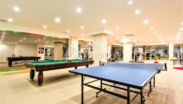 Срочная продажа большой квартиры 1+1 в элитном ЖК, 100 метров от моря в Махмутларе - Ракурс 22