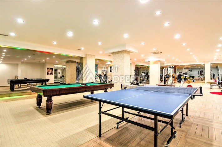 Срочная продажа большой квартиры 1+1 в элитном ЖК, 100 метров от моря в Махмутларе - Ракурс 21