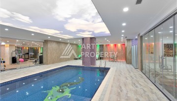 Срочная продажа большой квартиры 1+1 в элитном ЖК, 100 метров от моря в Махмутларе - Ракурс 24