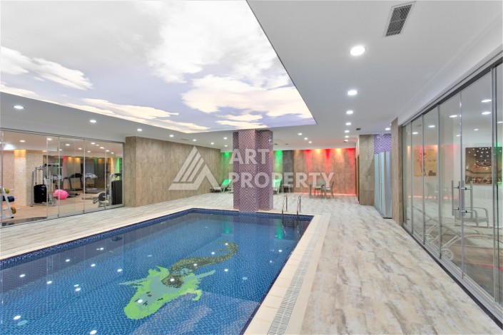 Срочная продажа большой квартиры 1+1 в элитном ЖК, 100 метров от моря в Махмутларе - Ракурс 23