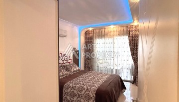 Срочная продажа большой квартиры 1+1 в элитном ЖК, 100 метров от моря в Махмутларе - Ракурс 29