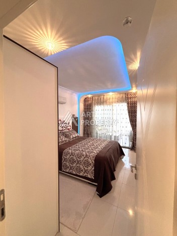 Срочная продажа большой квартиры 1+1 в элитном ЖК, 100 метров от моря в Махмутларе - Ракурс 28