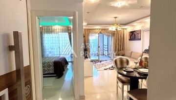 Срочная продажа большой квартиры 1+1 в элитном ЖК, 100 метров от моря в Махмутларе - Ракурс 30