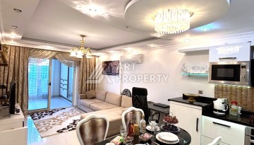 Срочная продажа большой квартиры 1+1 в элитном ЖК, 100 метров от моря в Махмутларе - Ракурс 31