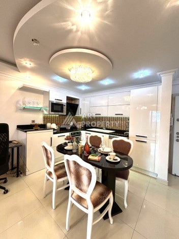 Срочная продажа большой квартиры 1+1 в элитном ЖК, 100 метров от моря в Махмутларе - Ракурс 35