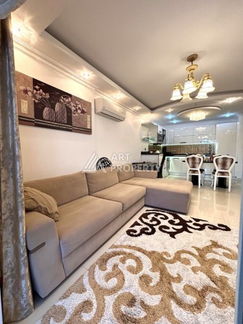 Срочная продажа большой квартиры 1+1 в элитном ЖК, 100 метров от моря в Махмутларе - Ракурс 37