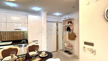 Срочная продажа большой квартиры 1+1 в элитном ЖК, 100 метров от моря в Махмутларе - Ракурс 39