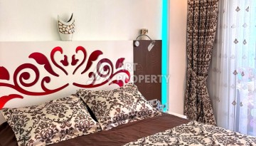 Срочная продажа большой квартиры 1+1 в элитном ЖК, 100 метров от моря в Махмутларе - Ракурс 41