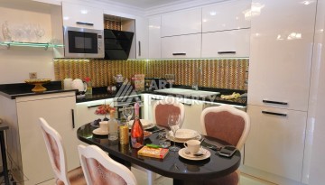 Срочная продажа большой квартиры 1+1 в элитном ЖК, 100 метров от моря в Махмутларе - Ракурс 42