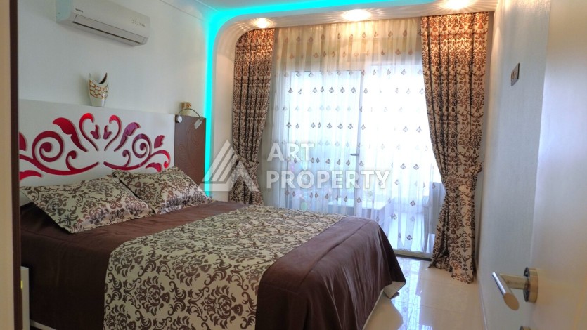 Срочная продажа большой квартиры 1+1 в элитном ЖК, 100 метров от моря в Махмутларе - Ракурс 43