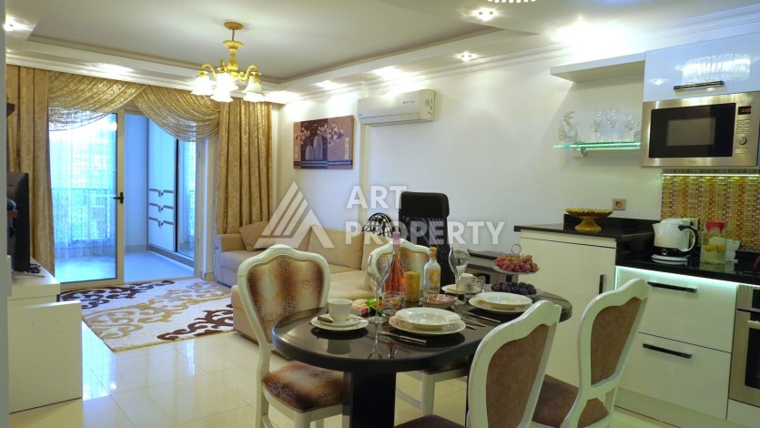 Срочная продажа большой квартиры 1+1 в элитном ЖК, 100 метров от моря в Махмутларе - Ракурс 45