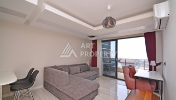 Квартира 1+1 с видом на море в элитном комплексе района Каргыджак - Ракурс 13