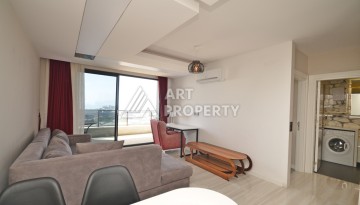 Квартира 1+1 с видом на море в элитном комплексе района Каргыджак - Ракурс 14