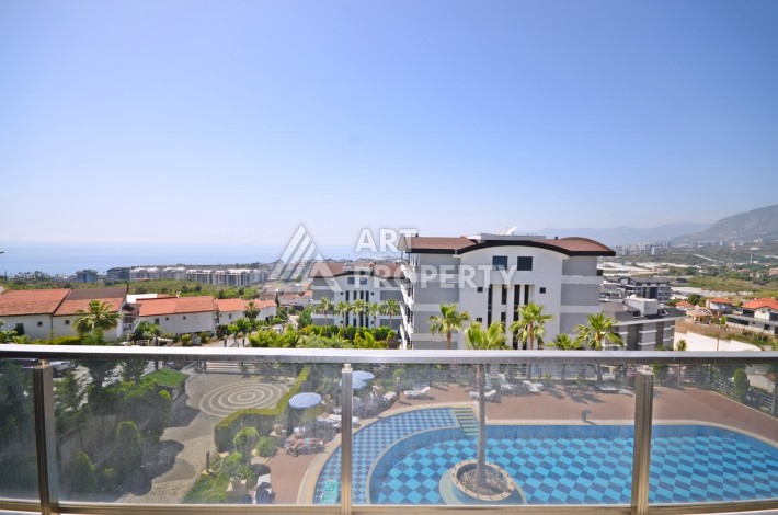 Квартира 1+1 с панорамным видом на море в элитном комплексе района Каргыджак - Ракурс 0