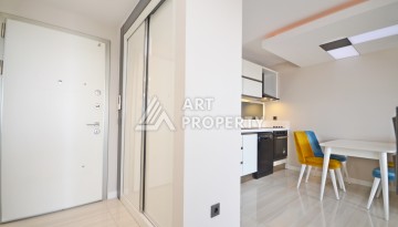 Квартира 1+1 с панорамным видом на море в элитном комплексе района Каргыджак - Ракурс 11