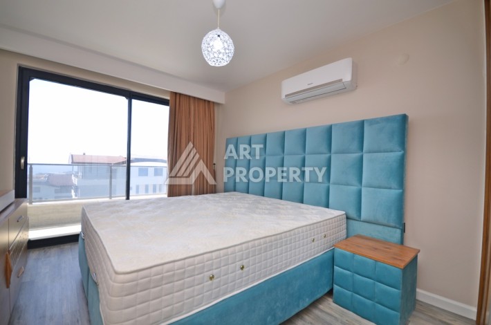 Квартира 1+1 с панорамным видом на море в элитном комплексе района Каргыджак - Ракурс 11