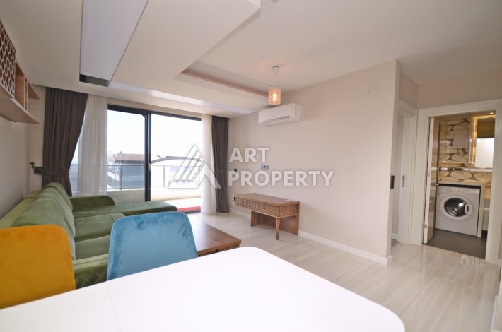 Квартира 1+1 с панорамным видом на море в элитном комплексе района Каргыджак - Ракурс 17