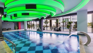 Квартира 1+1 с панорамным видом на море в элитном комплексе района Каргыджак - Ракурс 24