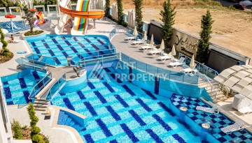 Квартира 1+1 в премиальном комплексе в районе Махмутлар — срочная продажа - Ракурс 1