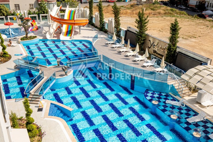 Квартира 1+1 в премиальном комплексе в районе Махмутлар — срочная продажа - Ракурс 0