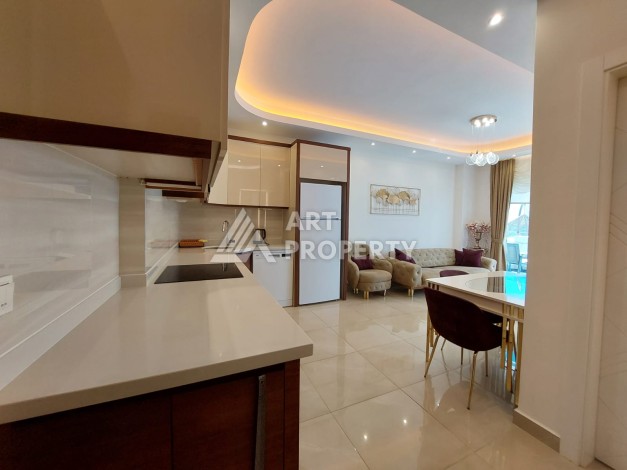 Квартира 1+1 в премиальном комплексе в районе Махмутлар — срочная продажа - Ракурс 1