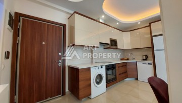 Квартира 1+1 в премиальном комплексе в районе Махмутлар — срочная продажа - Ракурс 7