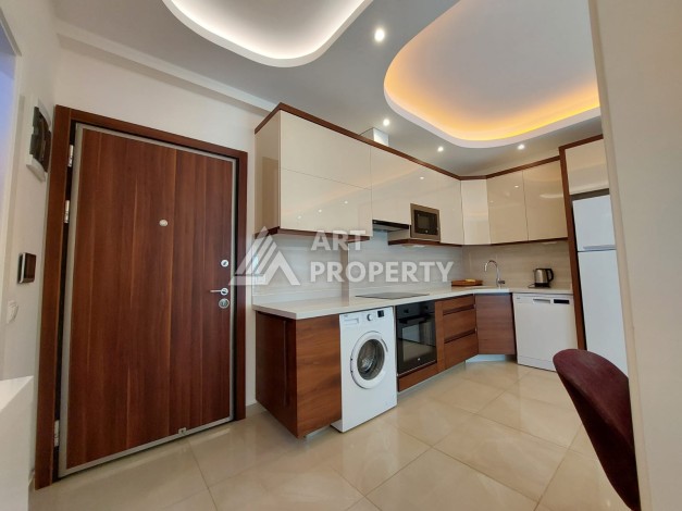 Квартира 1+1 в премиальном комплексе в районе Махмутлар — срочная продажа - Ракурс 6