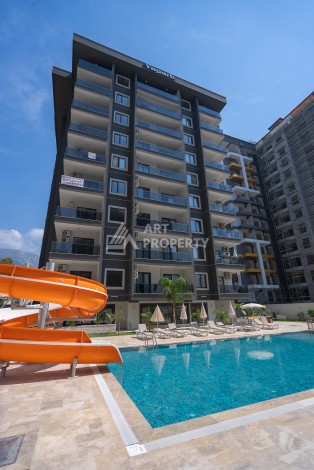 Элитные квартиры от 62 до 170 кв.м. в Махмутларе, 650 м до пляжа - Ракурс 2