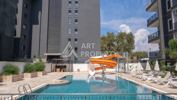 Элитные квартиры от 62 до 170 кв.м. в Махмутларе, 650 м до пляжа - Ракурс 4