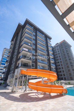 Элитные квартиры от 62 до 170 кв.м. в Махмутларе, 650 м до пляжа - Ракурс 4