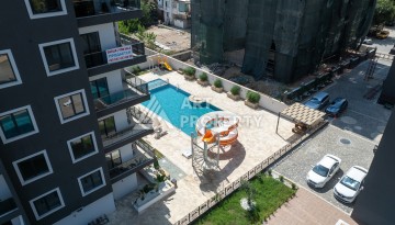 Элитные квартиры от 62 до 170 кв.м. в Махмутларе, 650 м до пляжа - Ракурс 7