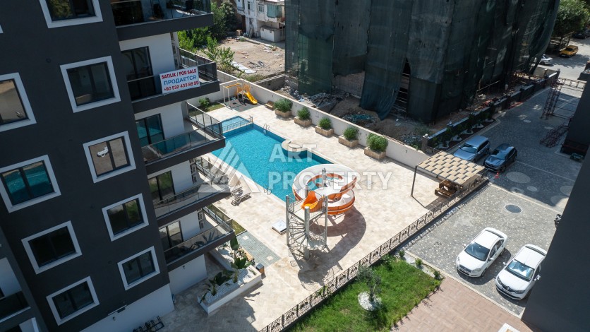 Элитные квартиры от 62 до 170 кв.м. в Махмутларе, 650 м до пляжа - Ракурс 6