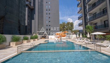 Элитные квартиры от 62 до 170 кв.м. в Махмутларе, 650 м до пляжа - Ракурс 10