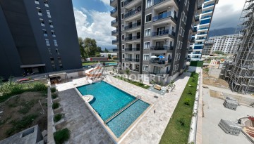 Элитные квартиры от 62 до 170 кв.м. в Махмутларе, 650 м до пляжа - Ракурс 43