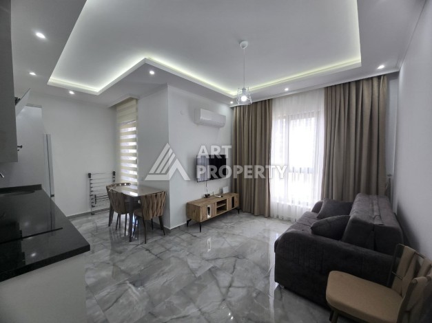 Меблированная квартира 1+1 в центре Махмутлара, 58 кв.м. - Ракурс 7