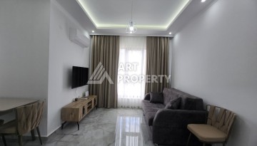 Меблированная квартира 1+1 в центре Махмутлара, 58 кв.м. - Ракурс 9