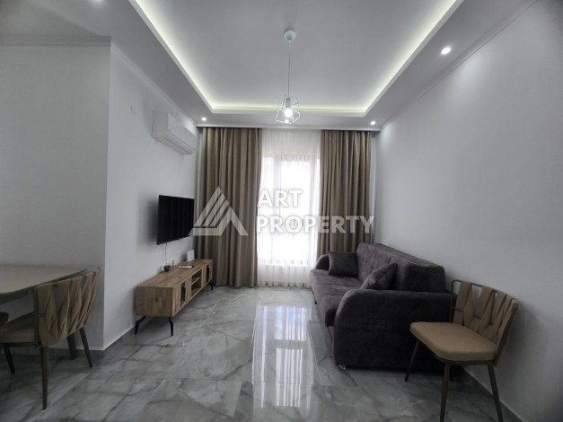 Меблированная квартира 1+1 в центре Махмутлара, 58 кв.м. - Ракурс 8